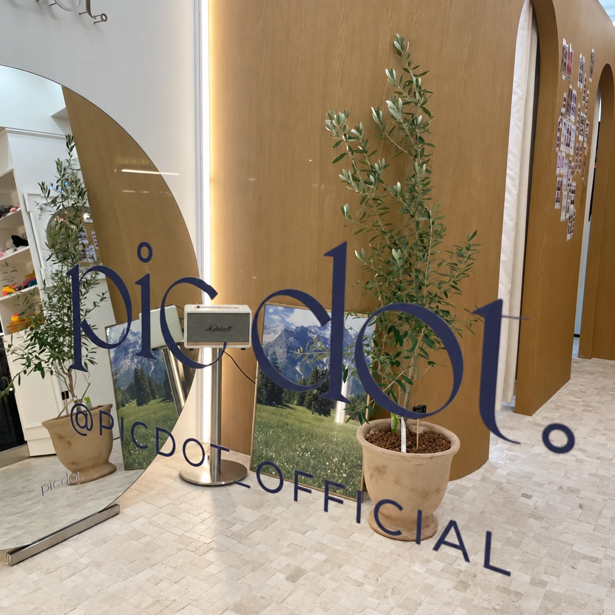 Pic Dot. self-photo studio in Apgujeong Rodeo — The wordmark layers over the interior.